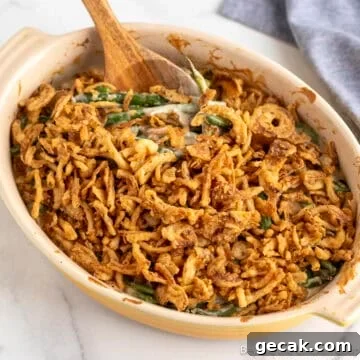 Homemade Green Bean Casserole in a yellow baking dish.
