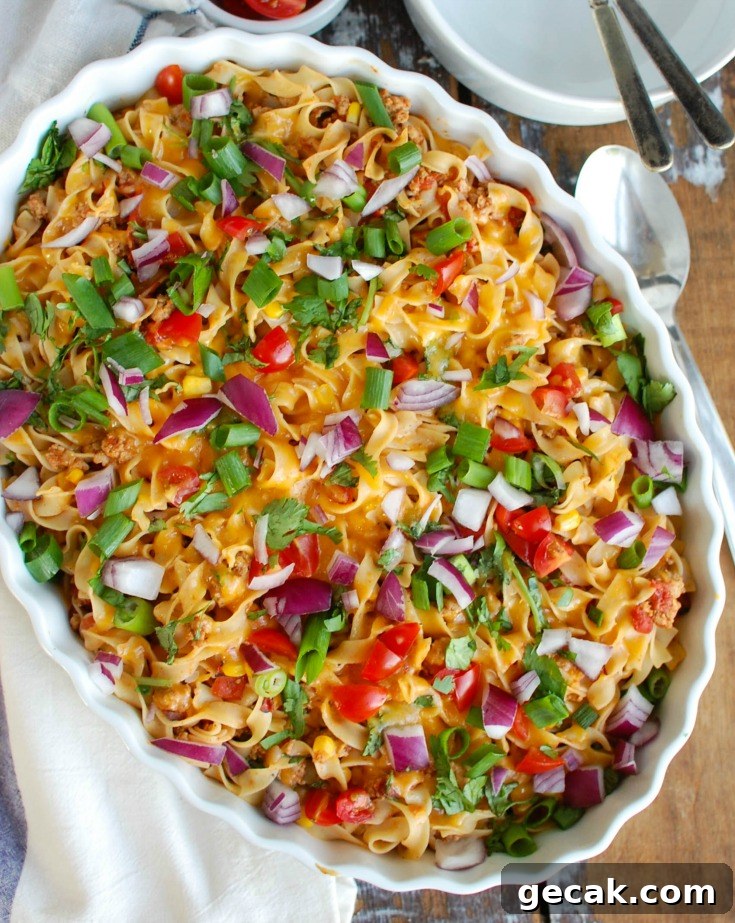 Served casserole with fresh garnishes.