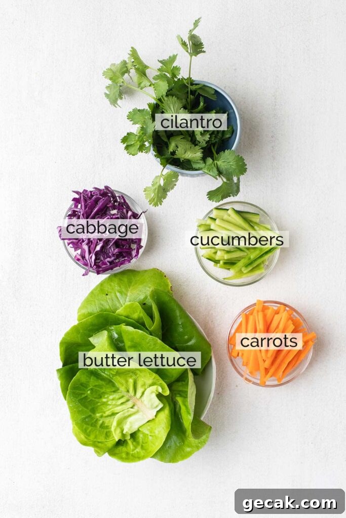 Spicy Thai Shrimp Lettuce Wraps — Low-Carb Dinner Idea 5 The ingredients needed to prepare lettuce wraps shown labeled.