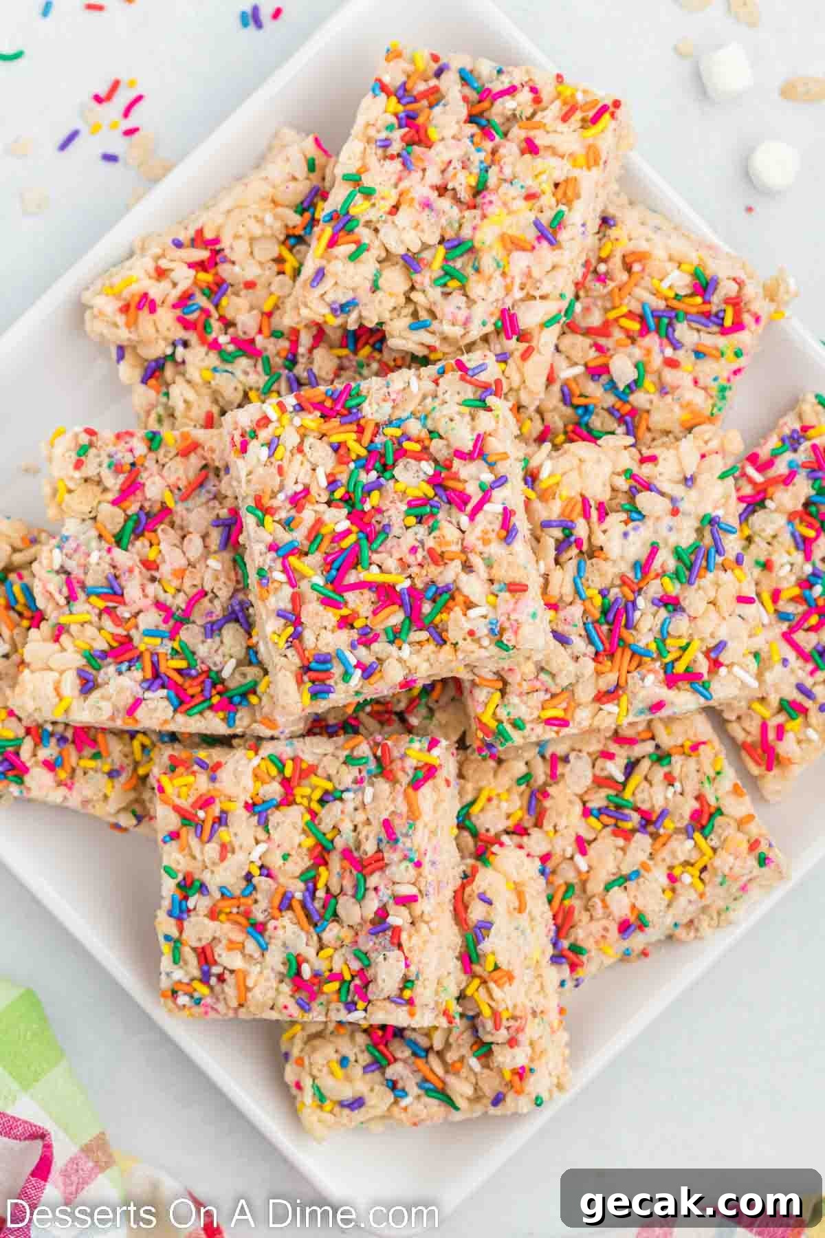 Cake Batter Rice Krispie Treats Recipe: Sweet Party Snack 2 Cake batter rice krispie treats on a plate.