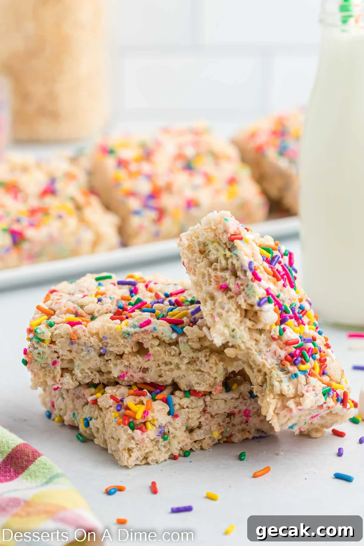 Cake Batter Rice Krispie Treats Recipe: Sweet Party Snack 4 Cake batter rice krispie treats on a plate.