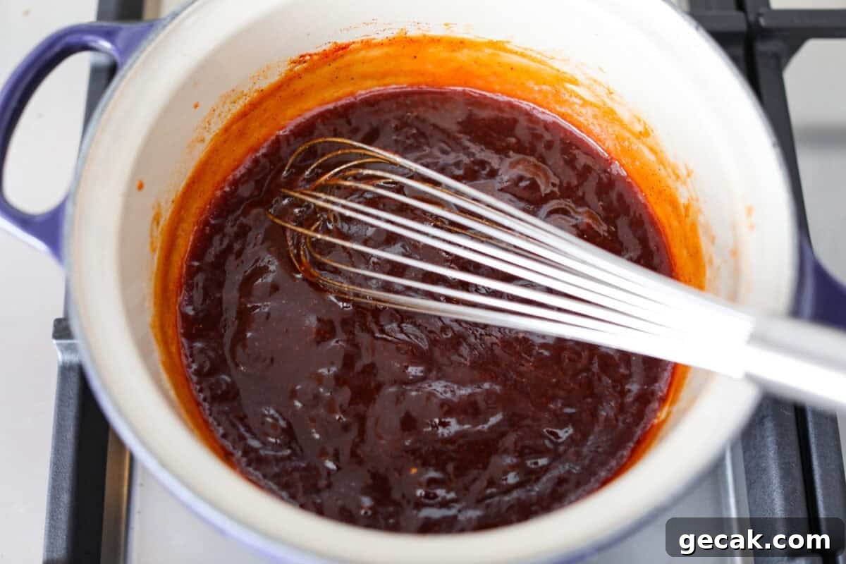 Sauce simmering in a pot.