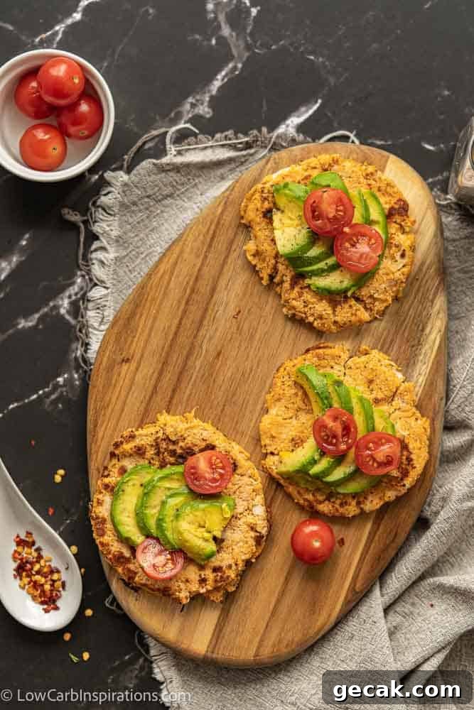 Savory Cauliflower Pancakes with Herbs and Parmesan 10 overhead photo of breakfast for dinner cauliflower pancakes topped with avocado and tomatoes