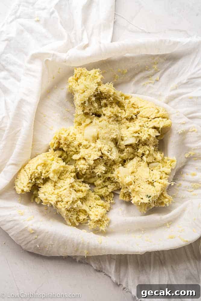 Savory Cauliflower Pancakes with Herbs and Parmesan 5 steamed cauliflower mashed in a cheesecloth