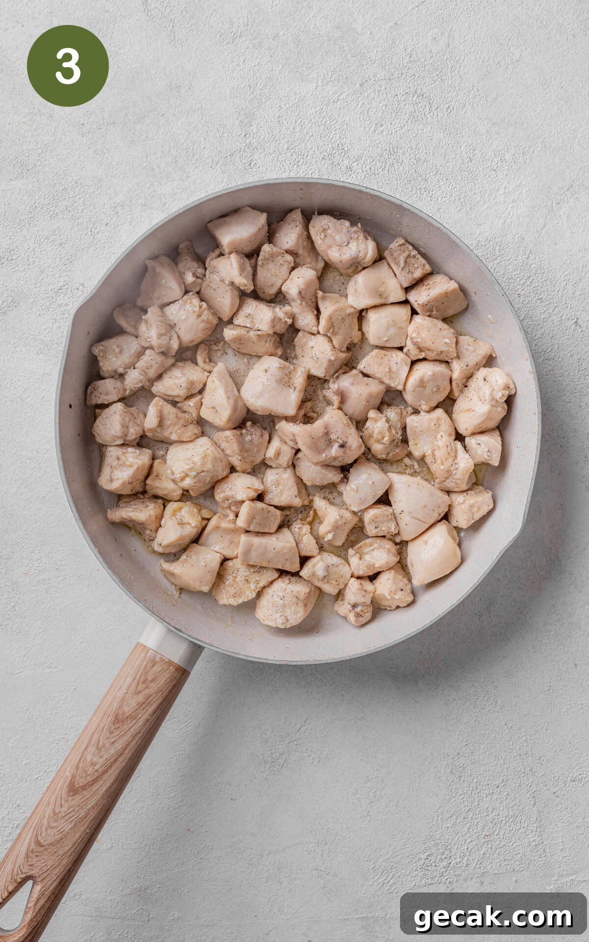 Creamy Chicken & Mushroom Pie Recipe for Home Baking 6 cooking chicken on olive oil in a skillet.