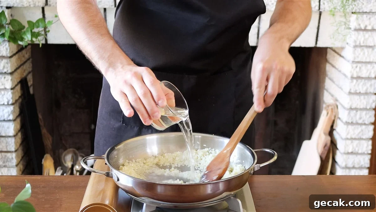 deglazing the rice with white wine