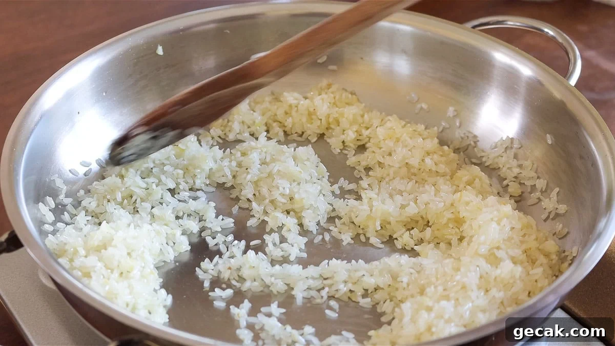 frying the onion and the rice