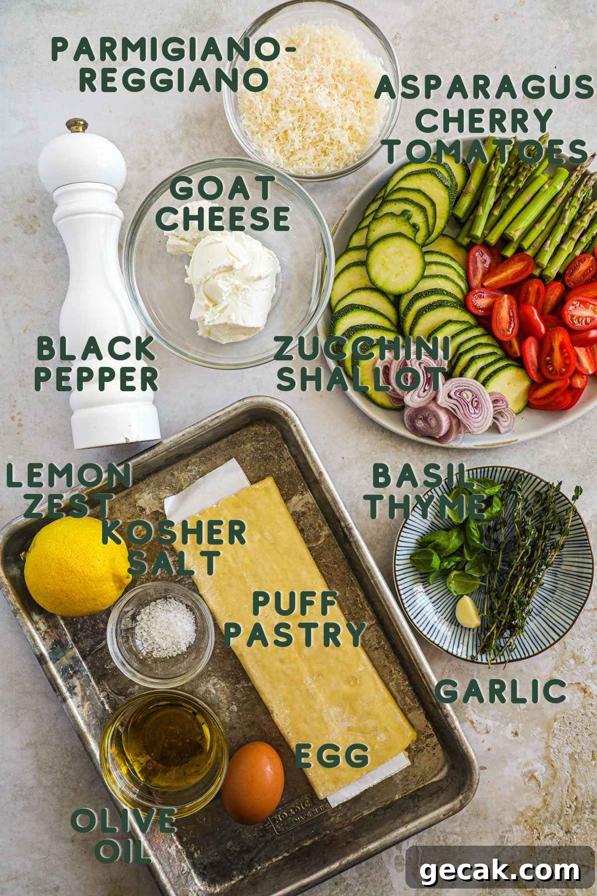 Savory Puff Pastry Vegetable Tarts for Entertaining 3 Ingredients to make puff pastry vegetable tarts, including puff pastry, egg, olive oil, lemon zest, kosher salt, black pepper, parmigiano-reggiano asparagus, cherry tomatoes, shallot, zucchini, goat cheese, basil, thyme, and garlic.