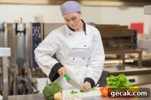 Female Chef Chopping Vegetables