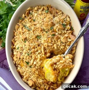 Cajun Squash Casserole with Cheesy Breadcrumb Topping 4 Squash casserole in baking dish.