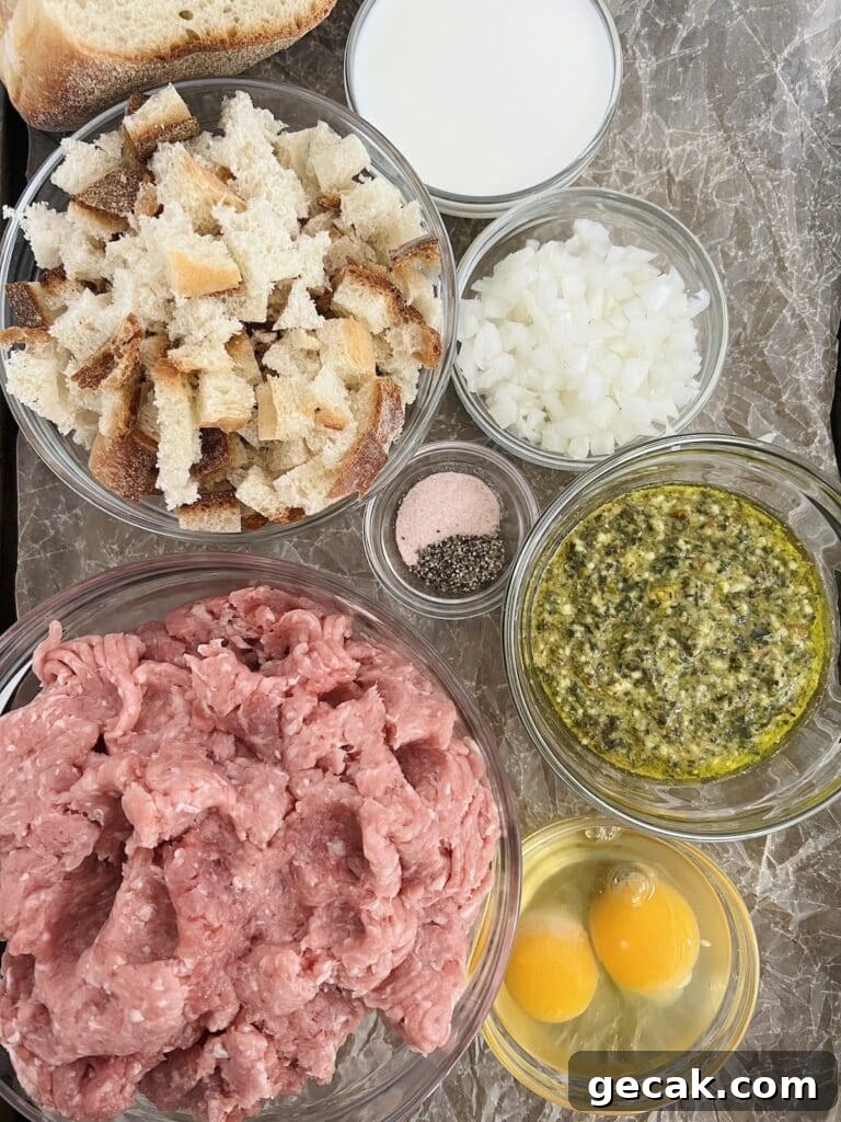 Overhead view of ingredients for easy baked turkey meatballs with pesto.