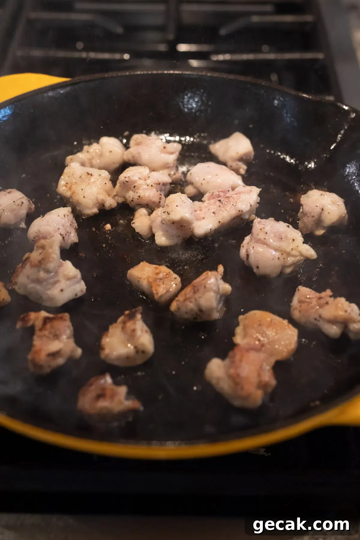cooking chicken in a skillet