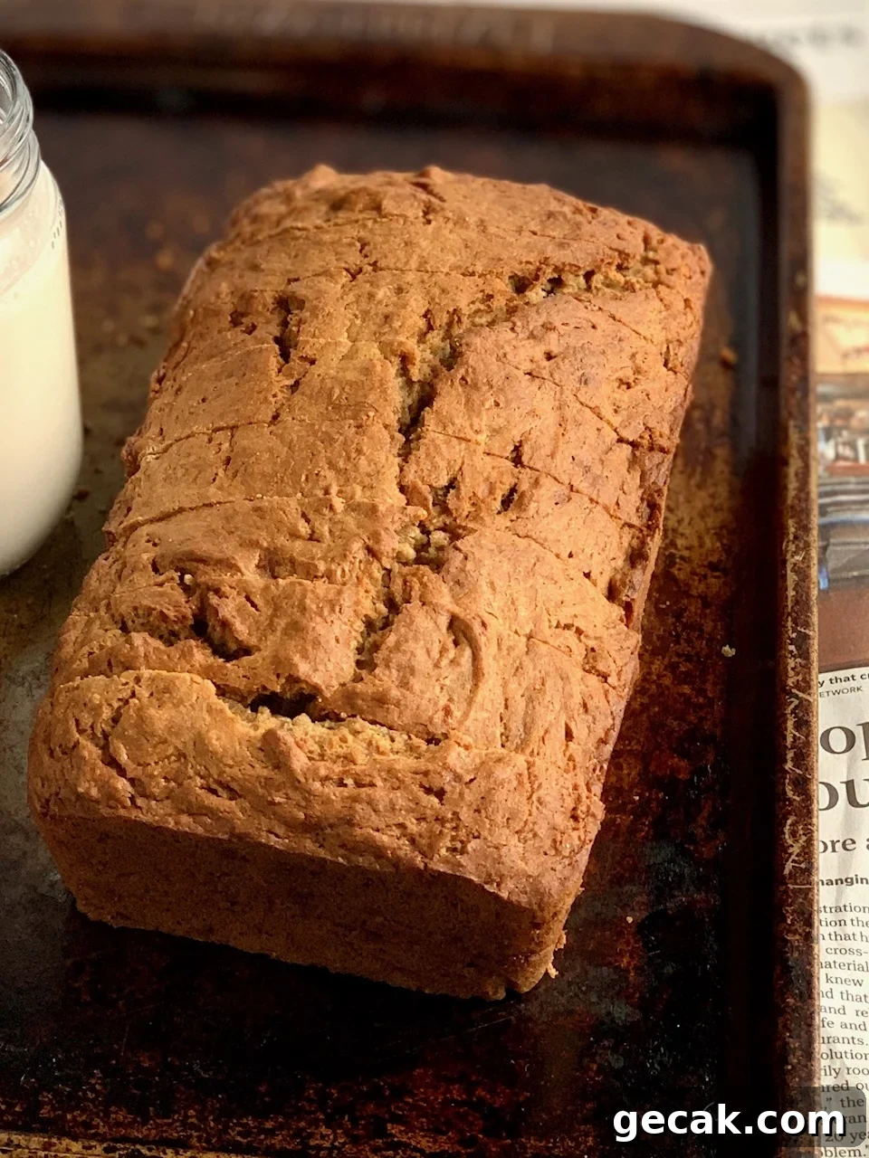 Sliced banana bread on a baking shett.