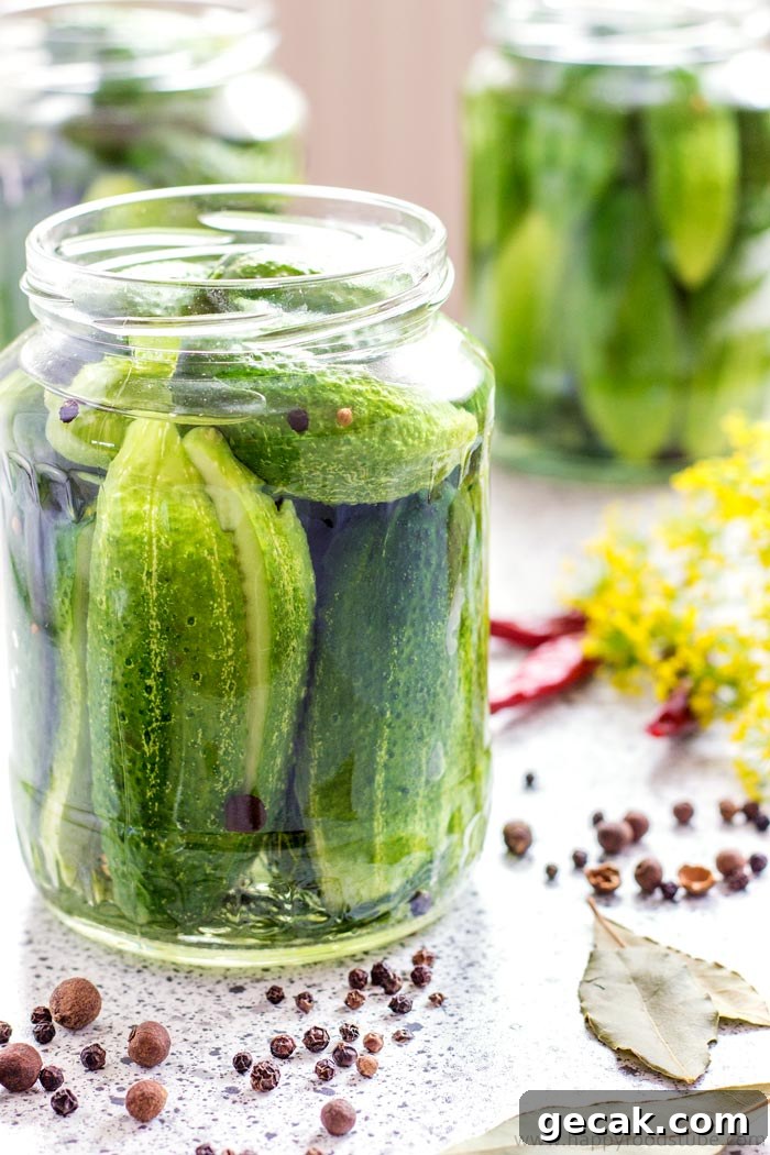 Let’s pickle some cucumbers! This spicy sweet and sour dill pickles recipe is our favorite and never disappoints!