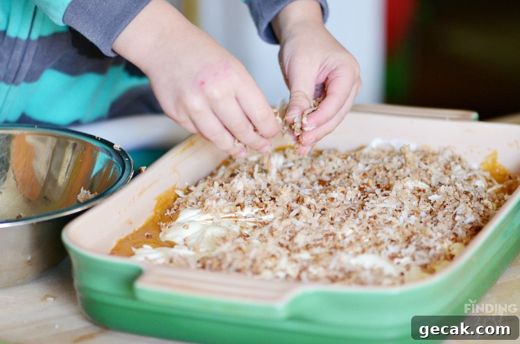 Pumpkin Cream Cheese Coffee Cake Recipe for Fall Gatherings 6 Adding Coconut Topping to Pumpkin Cream Cheese Coffee Cake