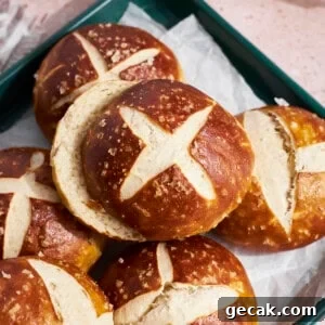 A stack of Sourdough Discard Pretzel Buns.