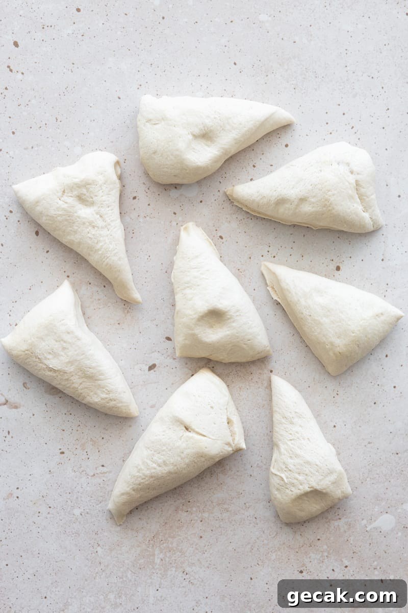Dough divided into 8 equal-size pieces. 
