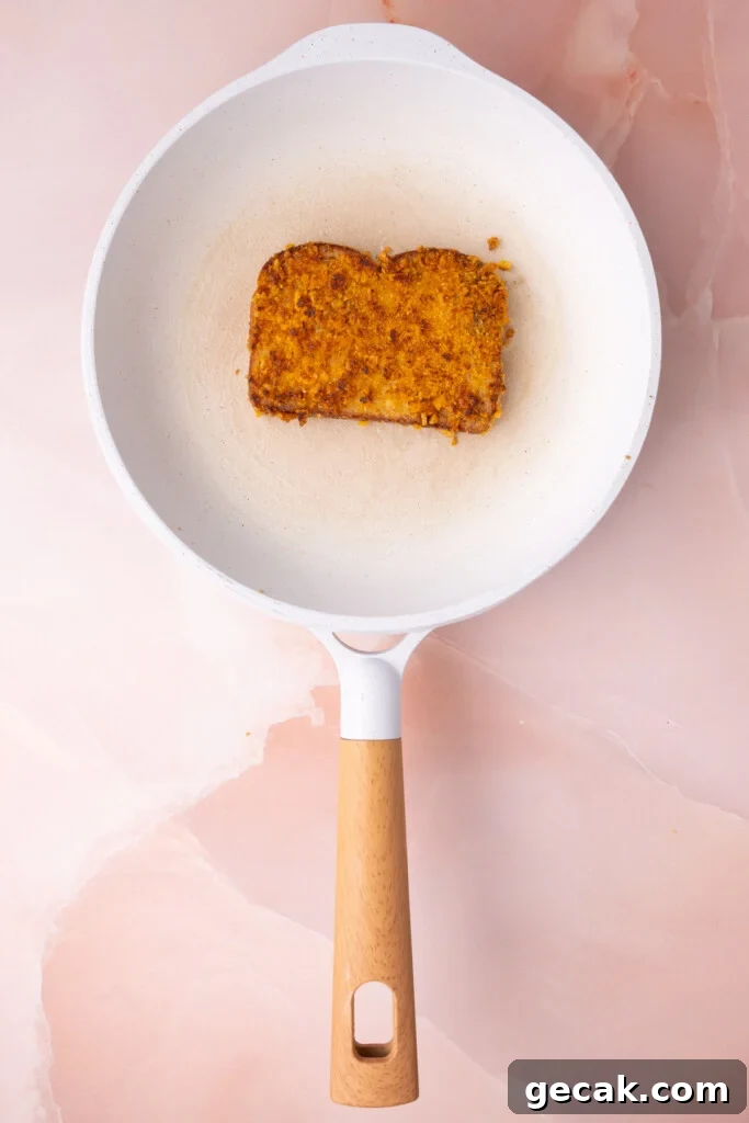 25-Minute Crunchy Cap'n Crunch French Toast Recipe 14 Cap'n Crunch French toast fried to golden brown perfection on both sides.