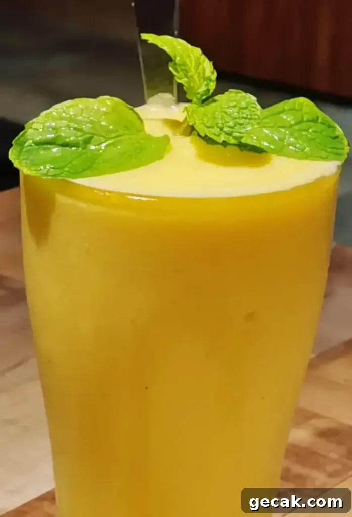 Caribou Lou Cocktail Recipe: How to Make the Tropical Rum Drink 2 Caribou Lou drink in a glass
