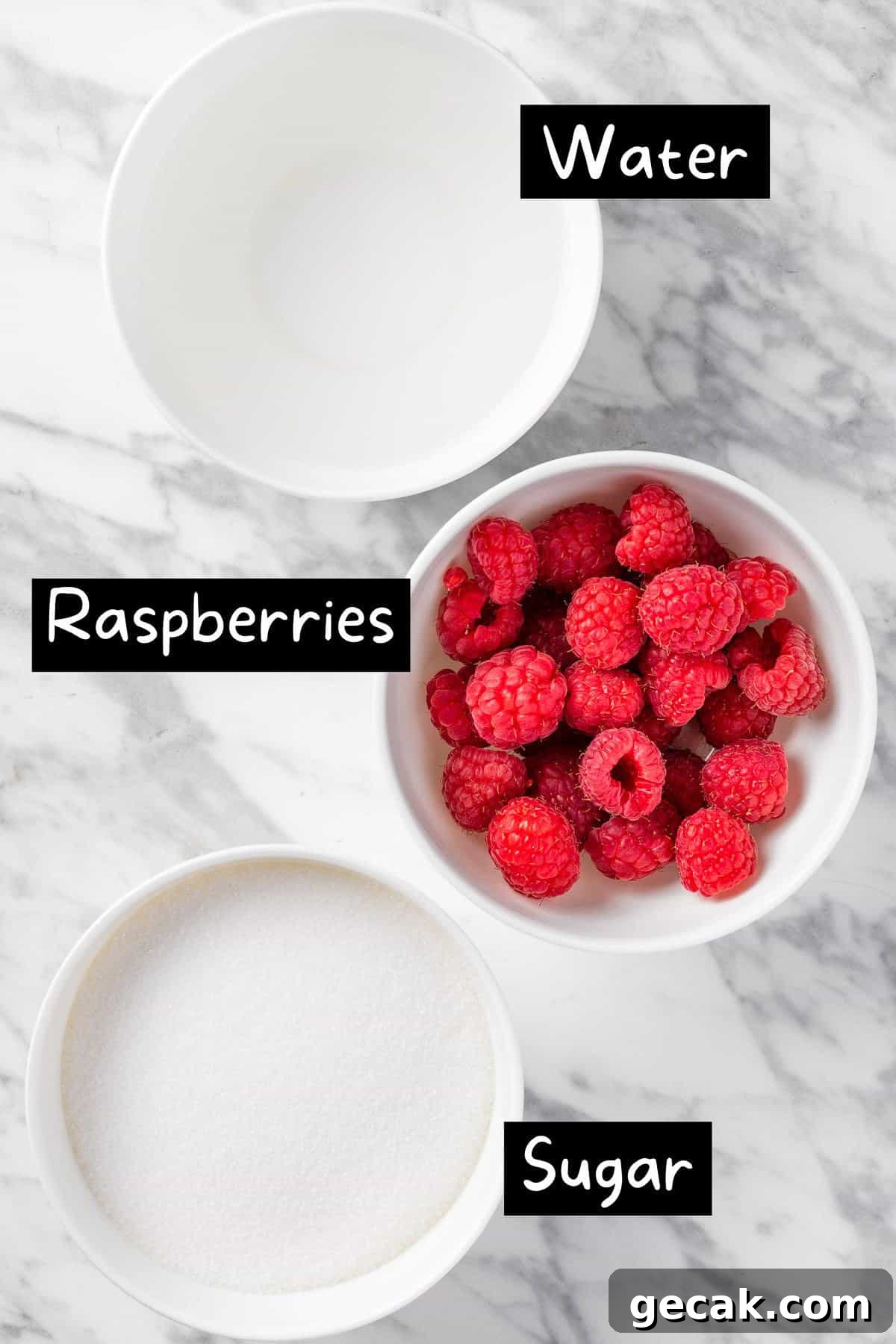 Homemade Raspberry Simple Syrup Recipe for Cocktails & Desserts 5 The ingredients needed to make the raspberry simple syrup.