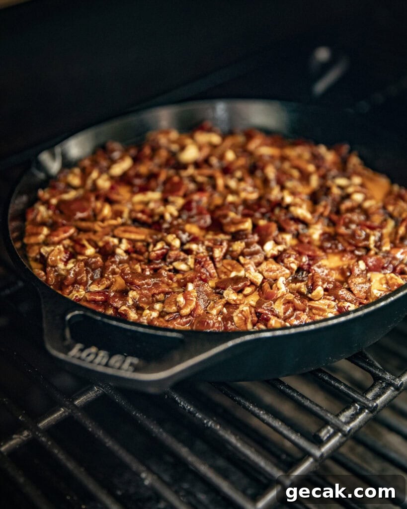Smoked Sweet Potato Casserole with Candied Bacon-Pecan Topping 8 Assemble and grill again