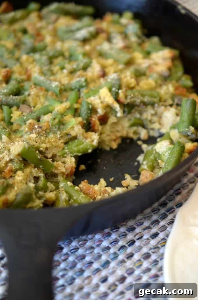 A close-up of green bean casserole in a skillet.