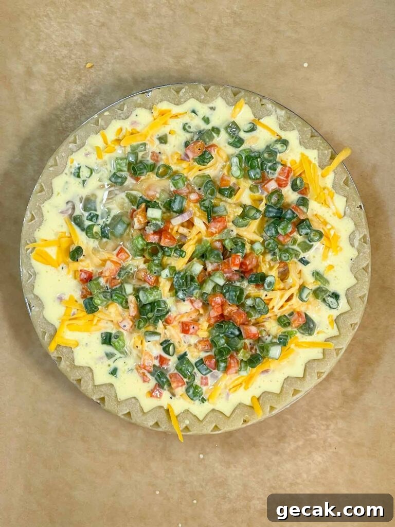 Southwestern Omelet Quiche Recipe – Flaky Crust & Savory Filling 13 Uncooked quiche ready for the oven.