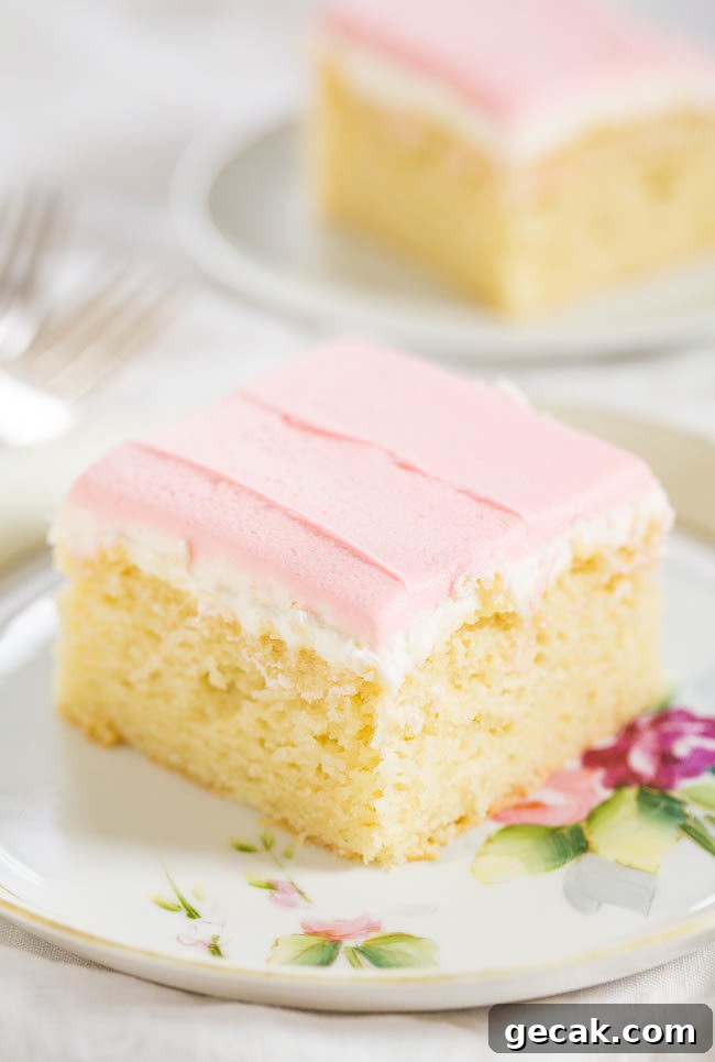 Easy Yellow Cake with Buttercream Frosting on a flower plate