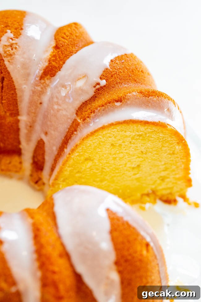 Easy Glazed Pound Bundt Cake with one slice removed