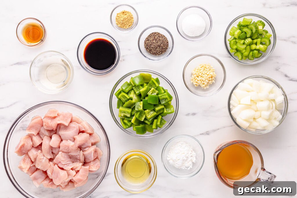 black pepper chicken ingredients in glass bowls on countertop