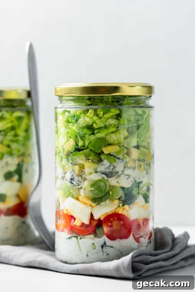 Cobb salad layered in a jar.