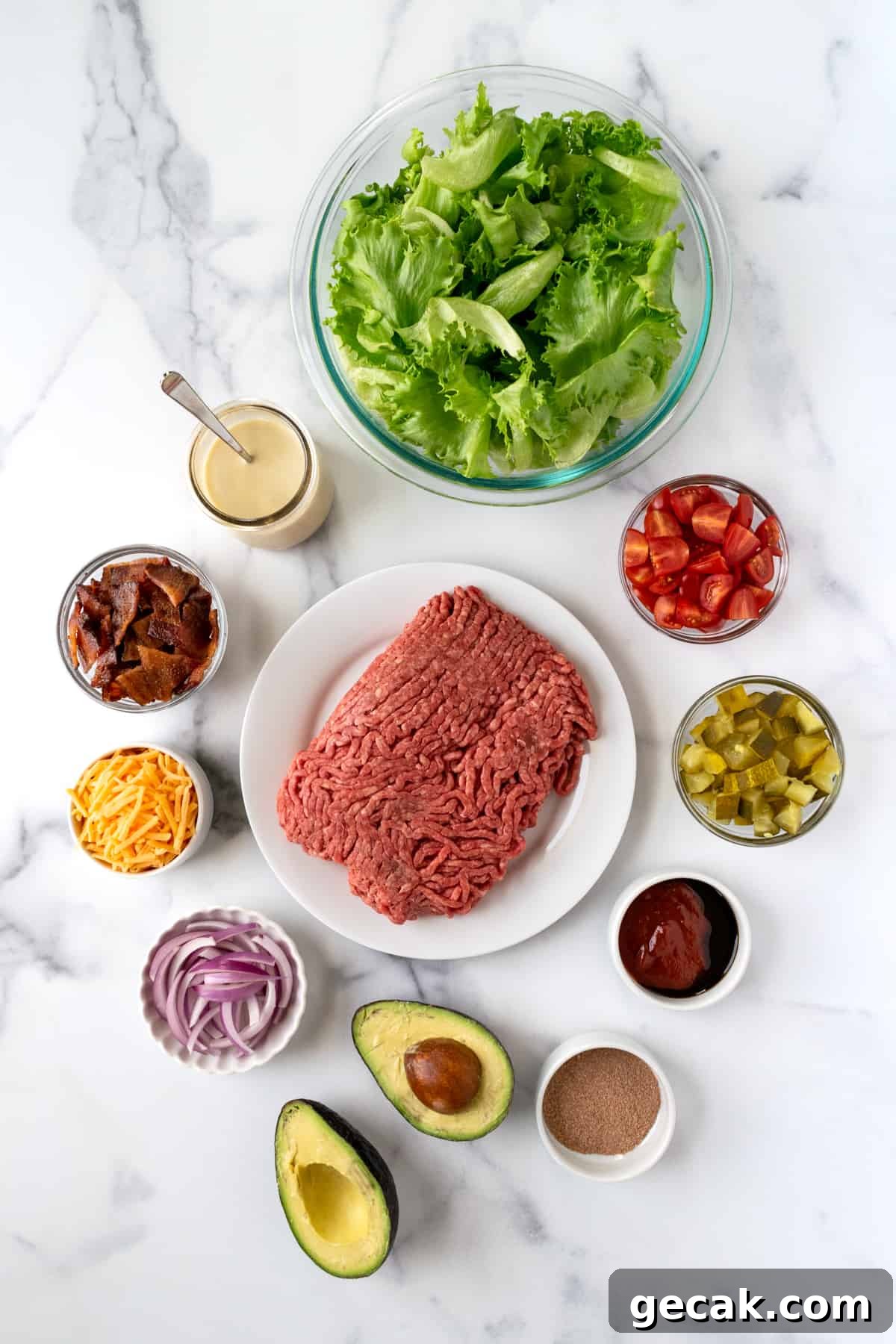 Burger Bowl Ingredients on a marble countertop.