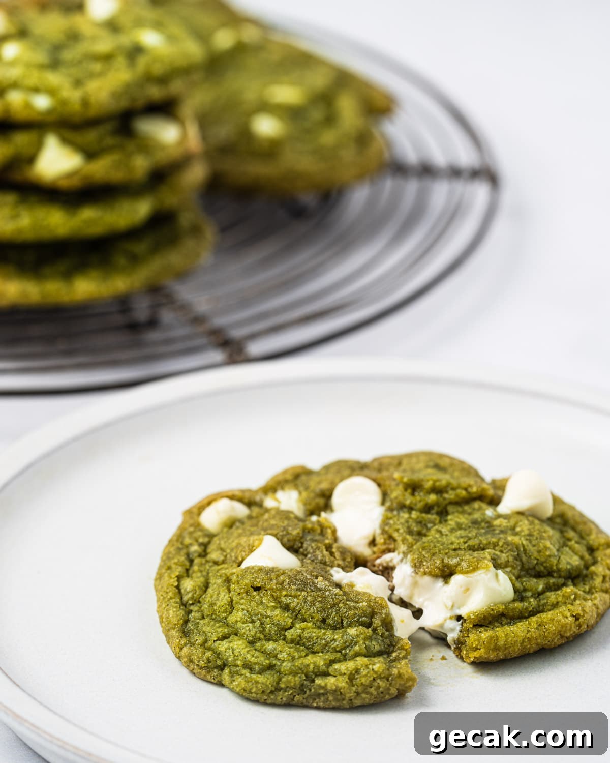 A plate of matcha white chocolate chip cookies.