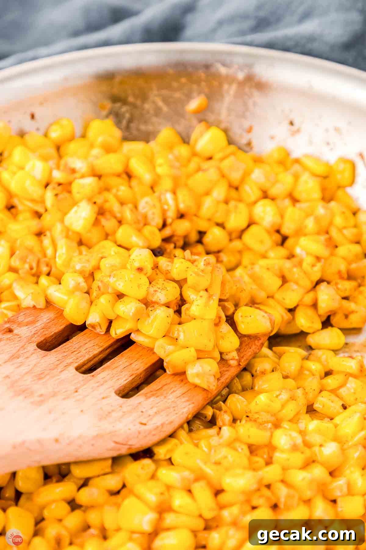 corn with a wood fork