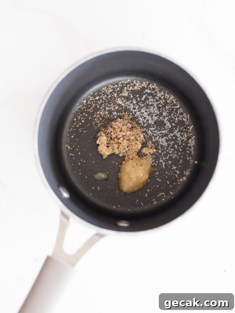 salt, pepper, garlic, and ginger in a sauce pan