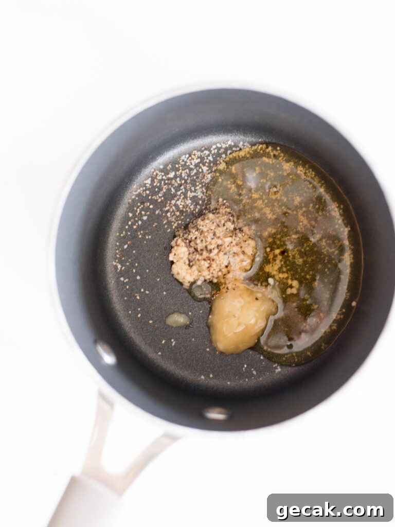 garlic, ginger, salt, pepper, and honey in a saucepan