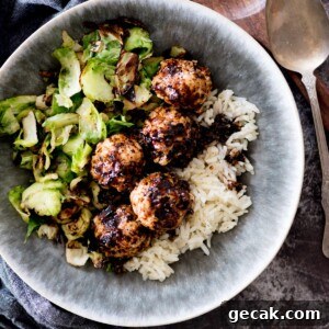 sticky sweet chicken meatballs in a bowl with rice and brussels sprouts