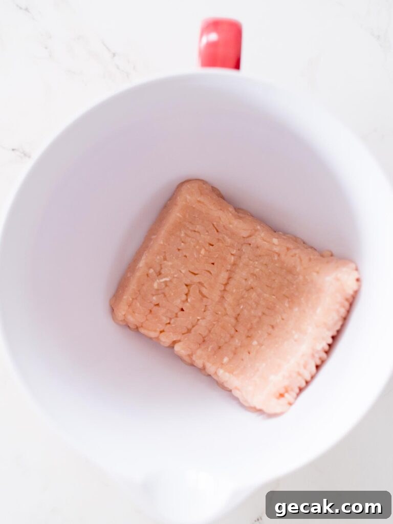 ground chicken in a mixing bowl