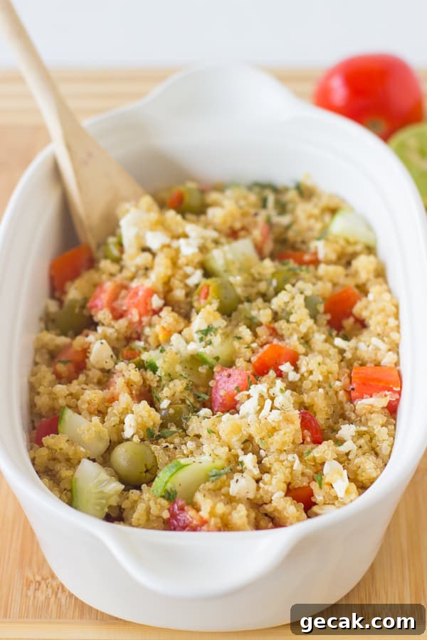 This Mediterranean Quinoa Salad is a quick and easy protein packed quinoa salad loaded with cucumbers, olives, feta cheese and delicious juicy tomatoes! It's all ready in under 30 minutes