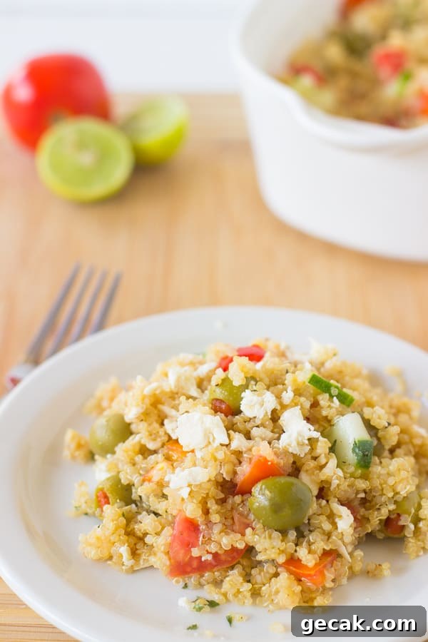 This Mediterranean Quinoa Salad is a quick and easy protein packed quinoa salad loaded with cucumbers, olives, feta cheese and delicious juicy tomatoes! It's all ready in under 30 minutes-3