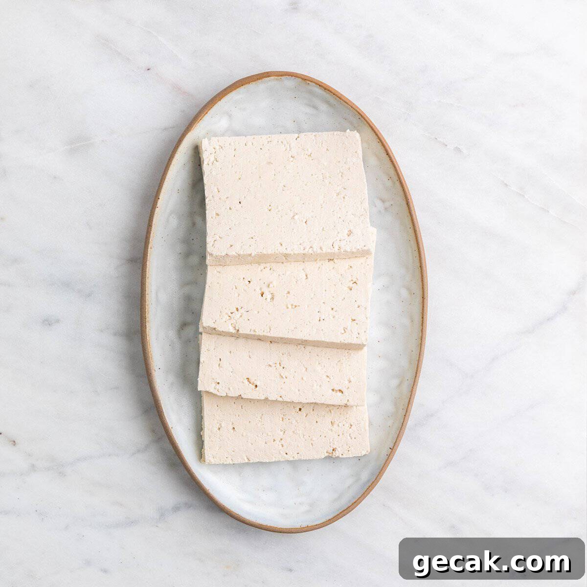 Tofu pieces on a plate.