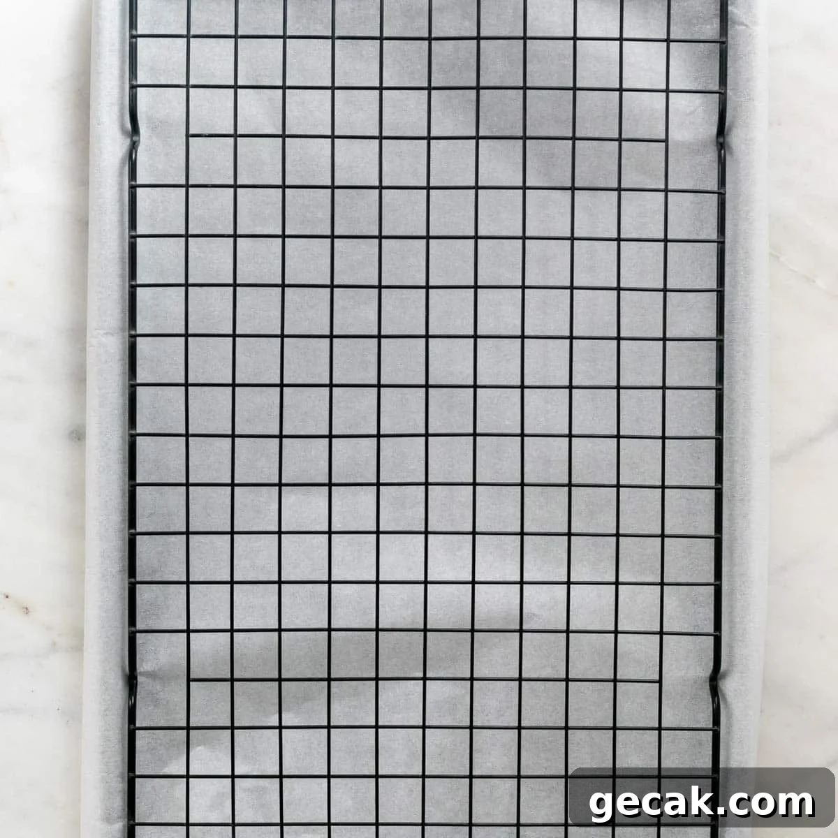 Wire rack on a lined baking sheet.