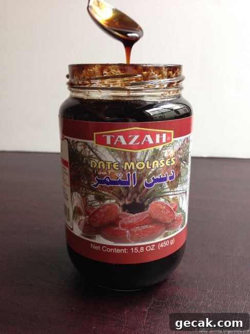 Date Syrup Uses: Delicious Pantry Ideas and Serving Tips 2 A jar of store bought date syrup.
