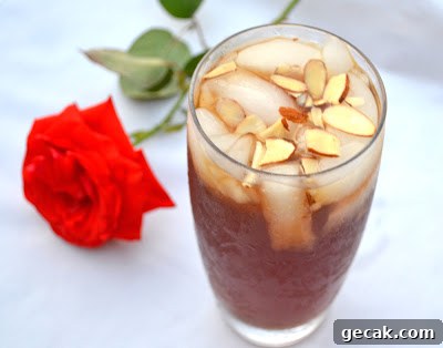 Date Syrup Uses: Delicious Pantry Ideas and Serving Tips 9 Jallab cocktail made with date syrup over ice.