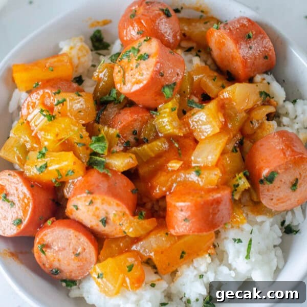 Crispy Air Fryer Hot Dogs: Quick, Juicy, and Ready in Minutes 10 closeup of sweet and sour hot dogs over rice