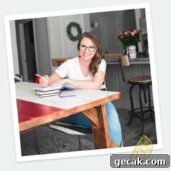Author sitting at table smiling