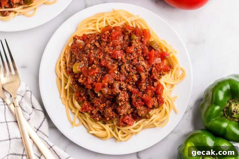 Homemade Spaghetti Sauce on a bed of spaghetti.