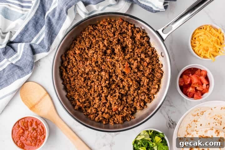 top-down view of the ground beef for tacos in the pan.