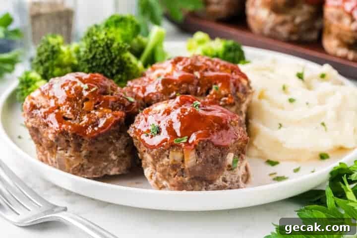 Mini meatloaf served with mashed potatoes and broccoli.