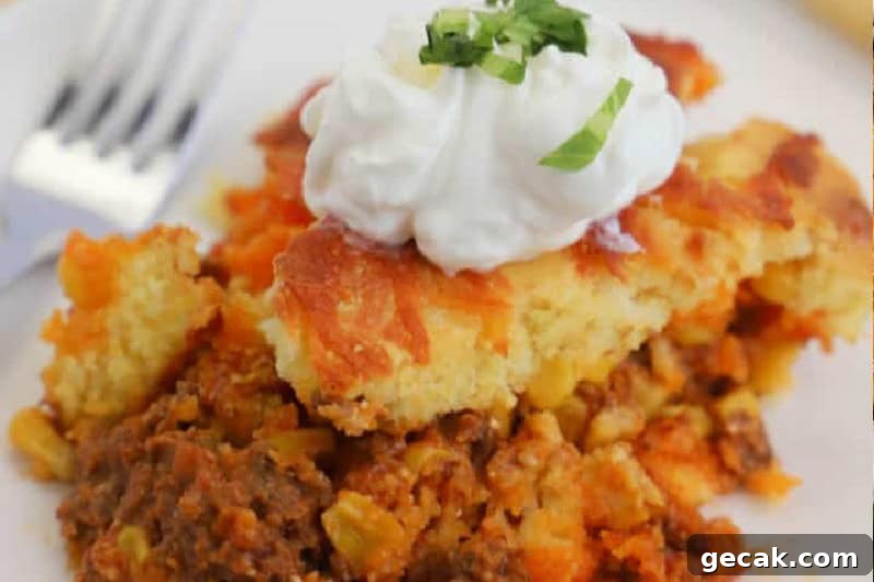 closeup of the Taco Cornbread Casserole on a white plate.